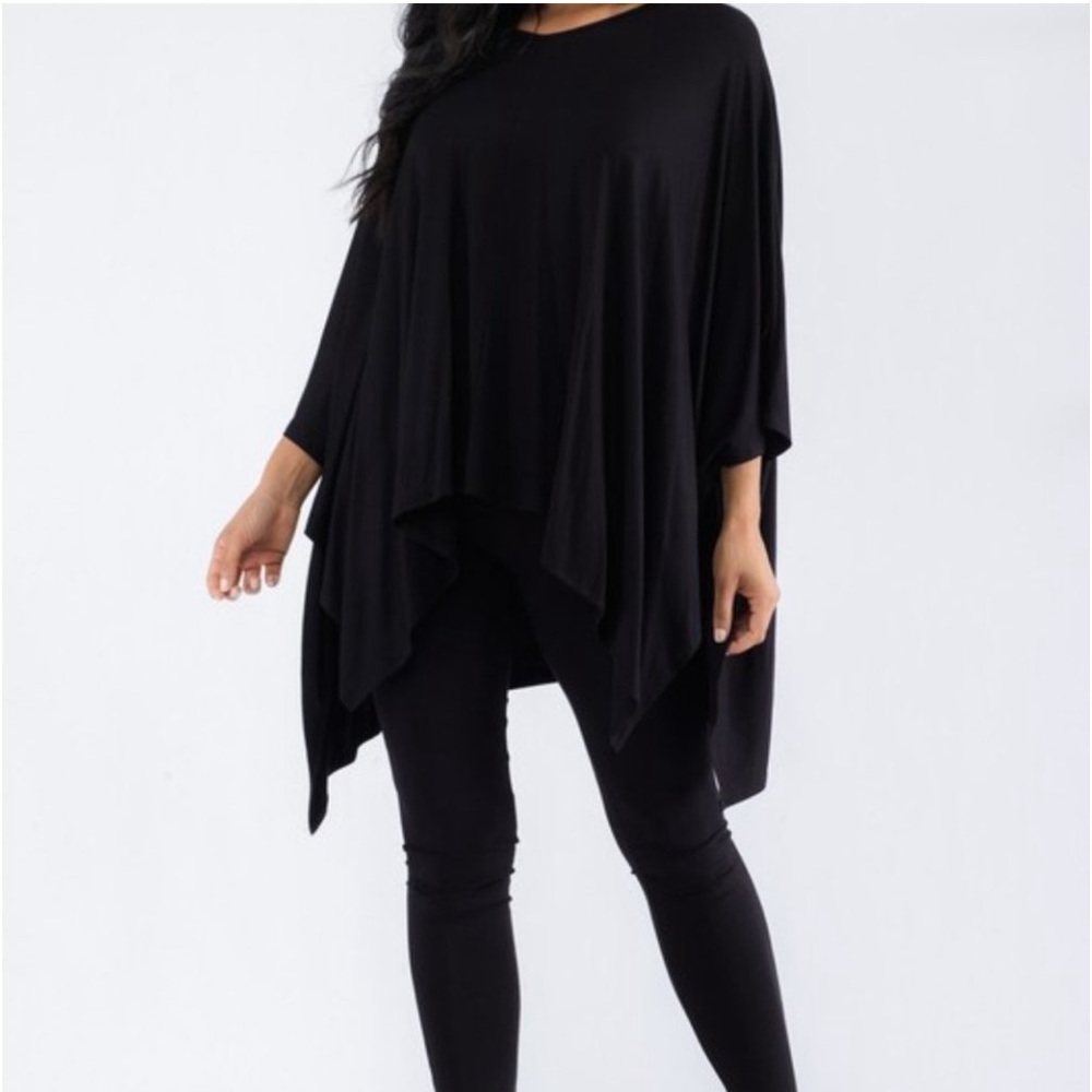 Two-Piece Leggings and Oversized Tunic. Has not been worn